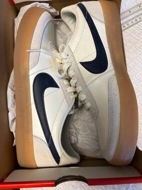 Nike White Leather Sneakers with Navy Swoosh and Gum Outsole